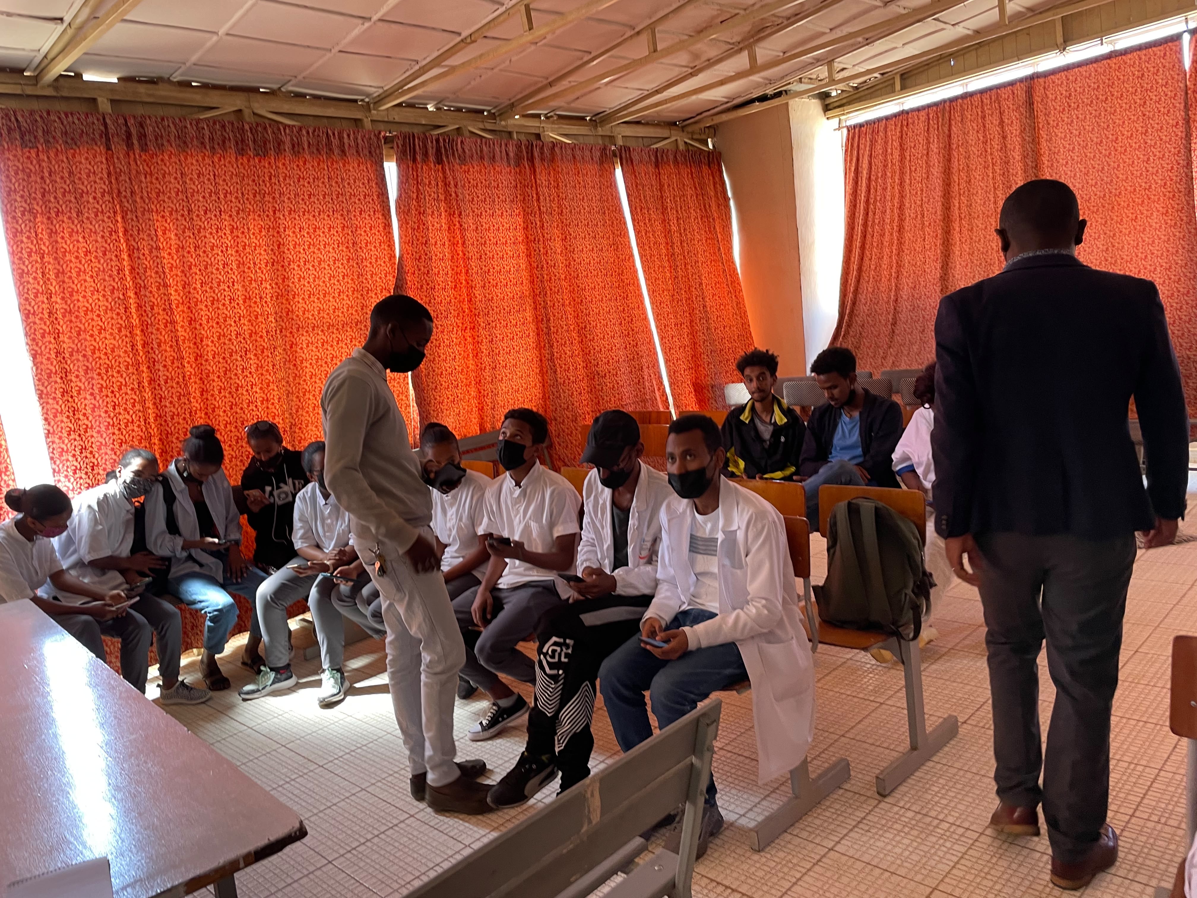 Health workers attending an African Vision communication and app training session